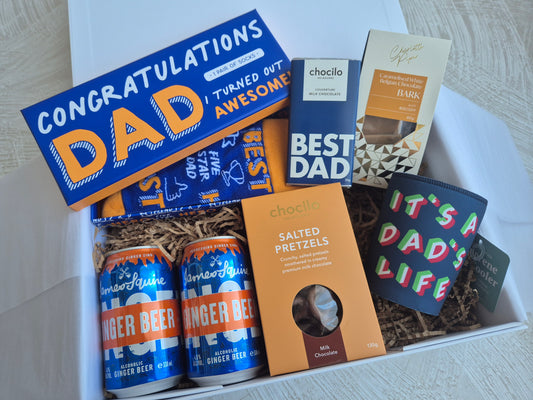 Father's day gift hamper featuring socks, ginger beer and treats