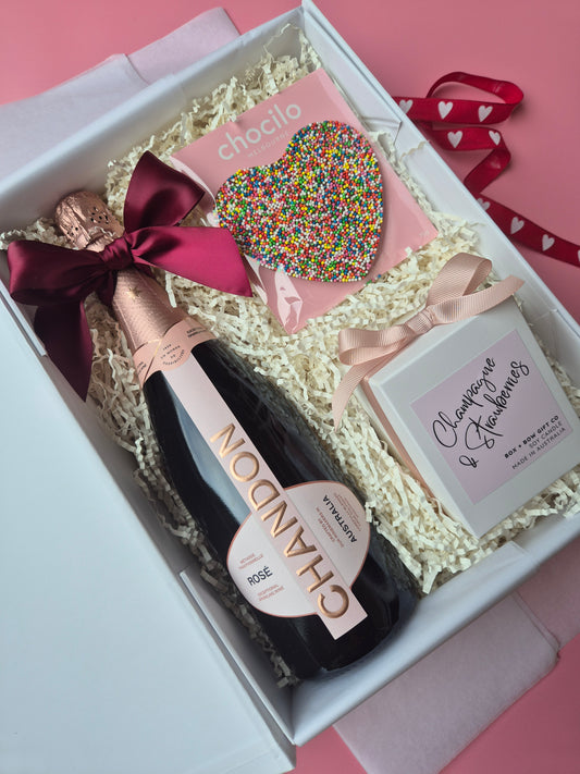 Valentine's Day gift Hamper
Valentine's Day Gift Box
Rose Pink Champagne, heart chocolate, champagne & strawberries candle